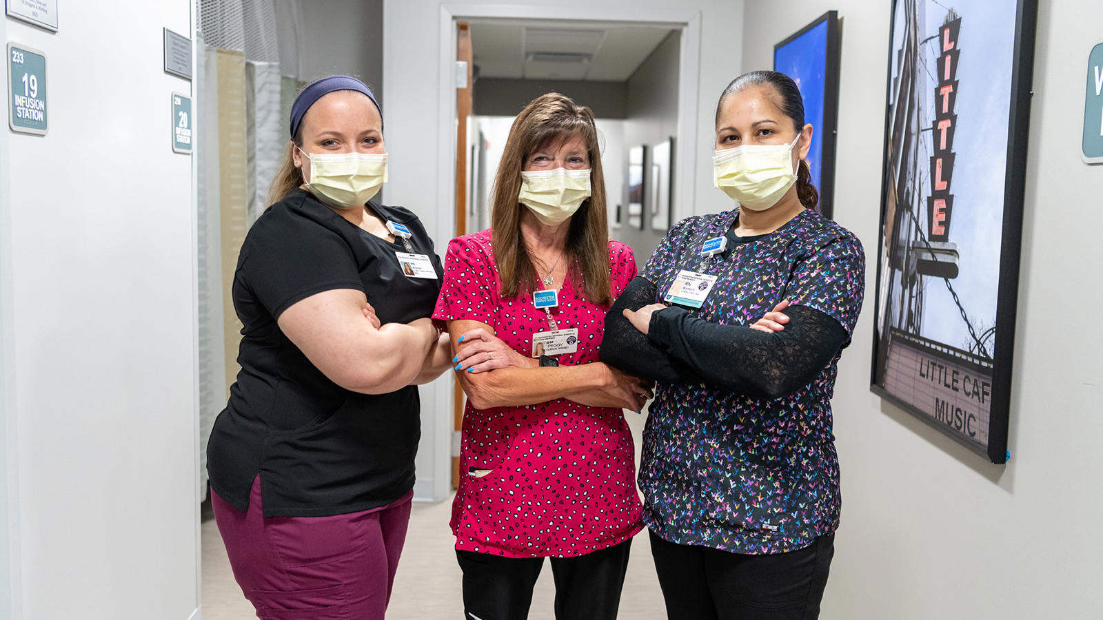 a group of women wearing face masks